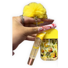 Load image into Gallery viewer, Boss Glam sanitizer keychain with lip gloss and hand sanitizer in yellow with fluffy pom on soft blush background